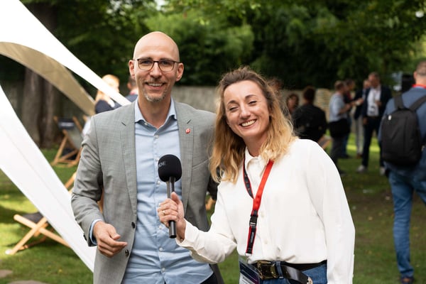 Aleksandra_Dramska-Manterys__Business_Development_Manager_at_Ailleron__conducts_an_interview_during_2nd_Ailleron_Innovation_Forum_2024_fintech_conference