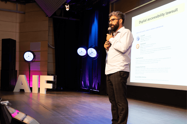 Piotr_Zrolka__CEO___UX_Designer___Strategist___Accessibility_Expert_at_Kinaole__leading_a_keynote_speech_during_Ailleron_Innovation_Forum_2024_fintech_conference